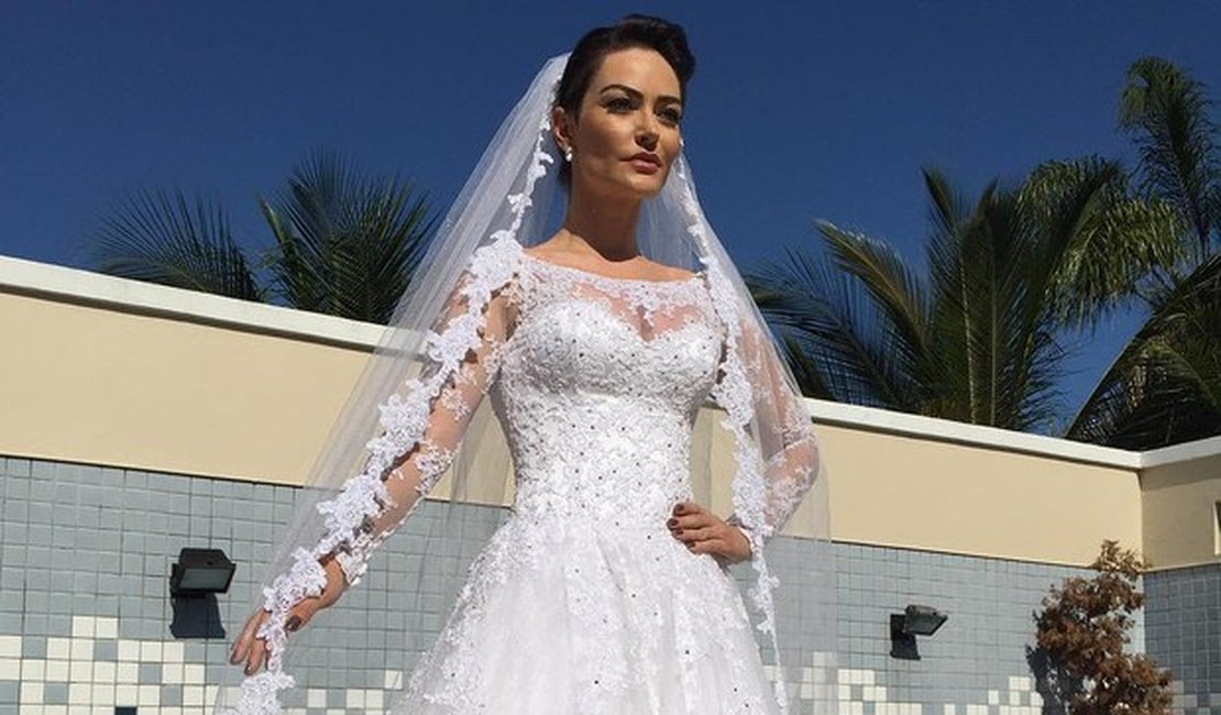 Prestes a se casar, Laura Keller posa vestida de noiva