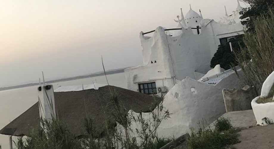 Sobre o pôr do sol mais lindo: Casa Pueblo