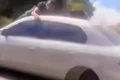 VÍDEO: Marido com ciúmes se pendura em carro em movimento e ataca motorista no DF