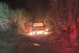 Veículo em chamas encontrado em canavial pode ser o mesmo tomado em assalto em Maceió