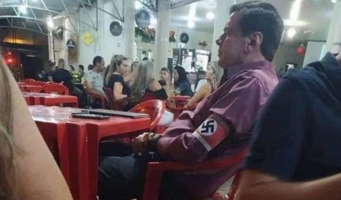 Homem que exibiu símbolo nazista em bar de MG será investigado