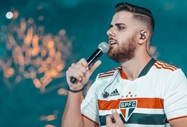 Palmeirense, cantor Zé Neto veste camisa do São Paulo e imita gay
