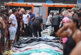 Moradores retiram cerca de 50 corpos em área de mata após operação