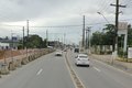 Colisão entre motocicleta e caminhão deixa pessoa ferida na Av. Menino Marcelo, em Maceió