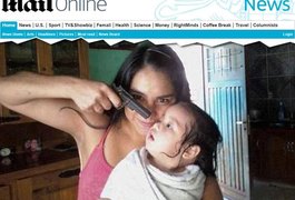 Foto de mulher apontando arma para um bebê gera revolta no Facebook