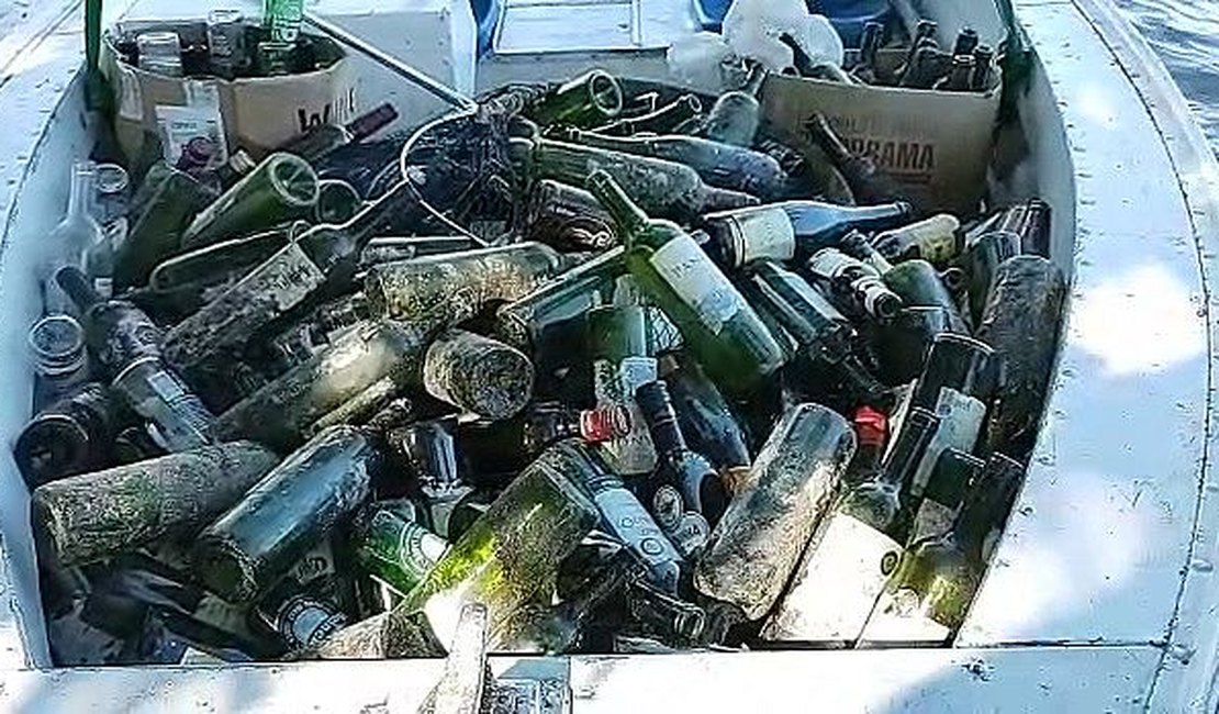 Batalhão de Polícia Ambiental encontra mais de 400 garrafas de vinho em área de mangue, em Marechal Deodoro
