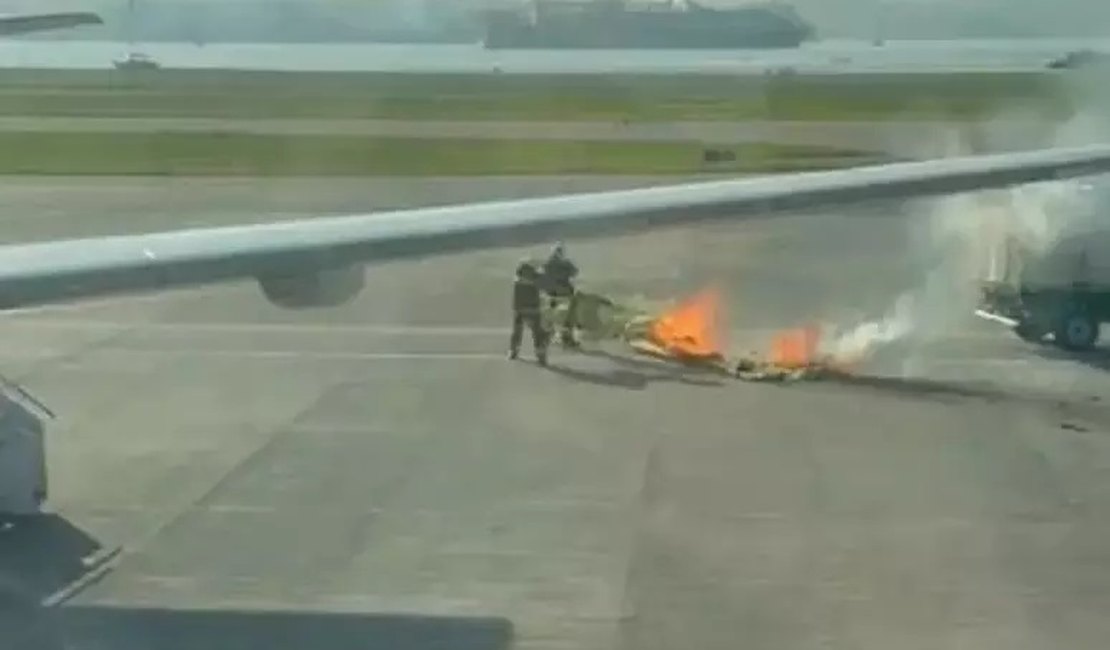 Balão cai em avião estacionado e pega fogo na pista do Aeroporto Santos Dumont