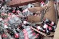 Caminhão carregado com Coca-Cola tomba na BR-101 e carga é saqueada por populares, em Alagoas