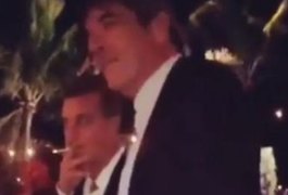 Em vídeo, Luciano Huck é flagrado tragando cigarro e fica sem graça