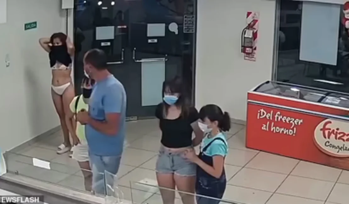 Vídeo: Mulher usa vestido como máscara e entra em sorveteria apenas de lingerie
